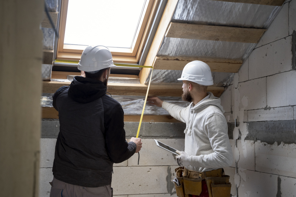 medium-shot-people-working-with-helmets.jpg